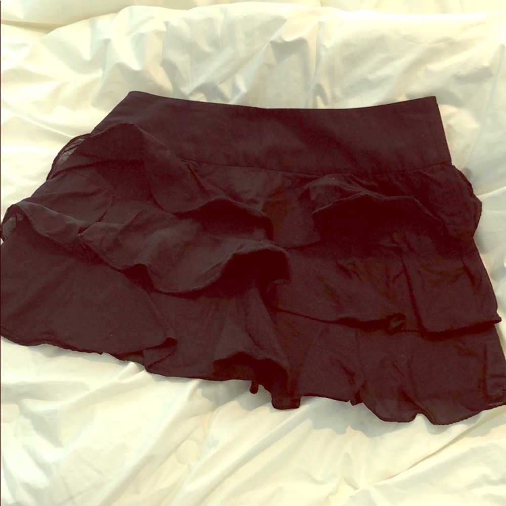 Black frilly mini skirt